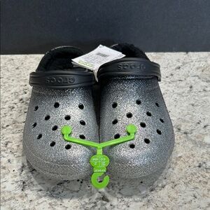 Crocs Unisex-Adult Classic Lined Glitter Clog. Mens size 9, Women’s size 11. NWT